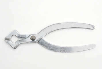 Metal sugar cutters on white background