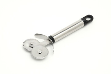 Pasta cutter on white background