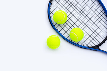 Tennis racket with balls on white.