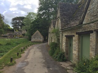 Fototapeta na wymiar Cotswolds, Village of Bibury, the prettiest places in the world, Traditional Old England Houses,