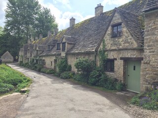 Fototapeta na wymiar Cotswolds, Village of Bibury, the prettiest places in the world, Traditional Old England Houses,