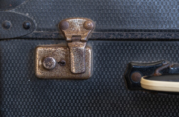 old and rusty lock on a vintage suitcase