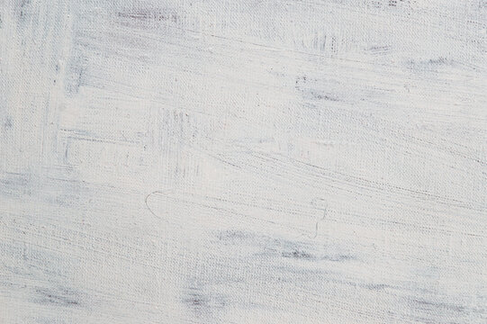 abstract light creative background - rough linen canvas unevenly covered with white primer. Toning, blur. Temporary object.