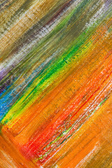 abstract rainbow multicolored background formed by erasing paints from the canvas, short focus. Not an art object, temporary effect.