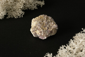 Chrysocolla from Peru. Natural mineral stone on black background. Mineralogy, geology, magic of stones, semi-precious stones and samples of minerals. Close-up macro photo.