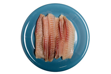 Close up of fresh or unfrozen set of filleted fish in a blue plate isolated on white..