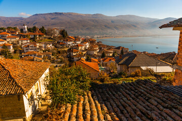 OHRID, NORTH MACEDONIA: Houses on the street in the historic center of the old town with views of Lake Ohrid. - obrazy, fototapety, plakaty