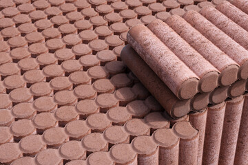 Garden Palisade Border Curb in store on palet. Decorate Palisade Lawn Edge Plant Border Concrete Cylinders for Path Garden architecture