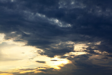 Clouds in contrast . Darkness and brightness on the sky