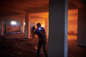 Obraz na płótnie Canvas military troops in action urban environment