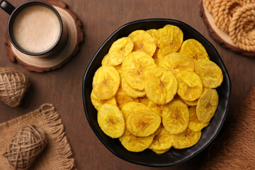 banana chips, popular Kerala snack deep fried in  coconut oil. traditional South Indian tea time snack on banana leaf, Kerala India on Onam, Vishu, Diwali, Ramzan