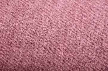 pink knitted fabric texture used as background