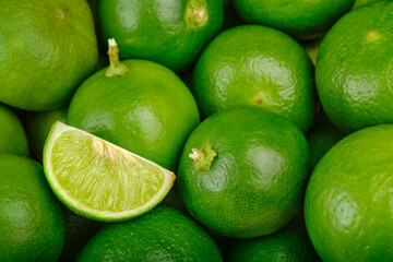 Fresh green lemon limes texture background.