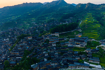 Dusk scenery of Qianhu Miao village in Xijiang, Qiandongnan, Guizhou Province, China