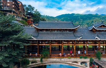 Fototapeta premium Dusk scenery of Qianhu Miao village in Xijiang, Qiandongnan, Guizhou Province, China