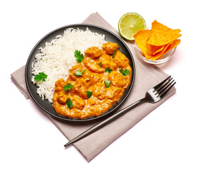 Plate of Traditional Chicken Curry and nachos isolated on white background with clipping path embedded