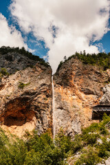 Rinka waterfall located in Logarska dolina national park in Slovenia, Second highest waterfall in Slovenia. Popular hiking destination in the Alps © Zedspider