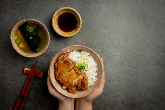 Toriyaki chicken on dark background