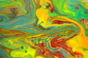 Abstract bright marble pattern with golden glitter. Fluorescent artwork liquid paint background.