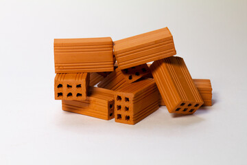 A pile of toy bricks on a white background