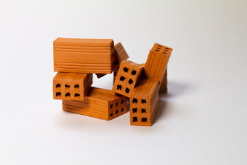 A pile of toy bricks on a white background