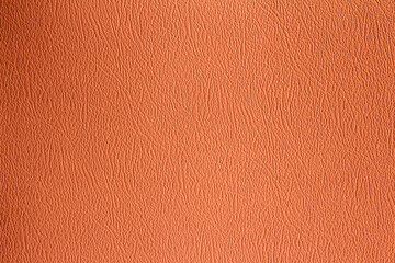 Orange or brown background of leather sheet texture 