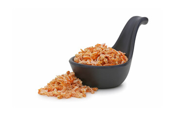 Small dried shrimp on a black cup with isolated white background.