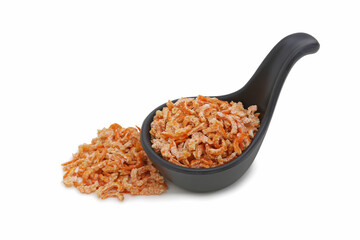 Fototapeta na wymiar Small dried shrimp on a black cup with isolated white background.