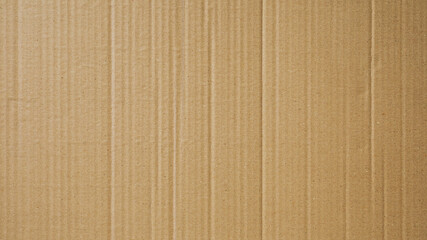 Fototapeta na wymiar Cardboard texture, Paper box or packing paper, Brown vertical corrugated and folded use for background, Close up