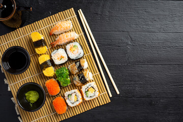 Traditional sushi on dark background