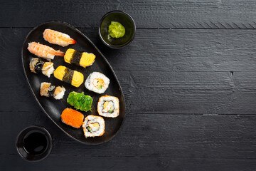 Traditional sushi on dark background