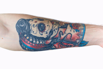 tattoo on arm close-up lifestyle light background