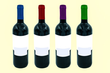 A set of 4 wine bottles with different colored corks. Still life shot for mockup.