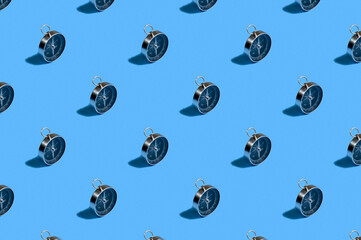 Pattern of compass. Trendy background of compass on a blue background. Colorful pattern. View from above