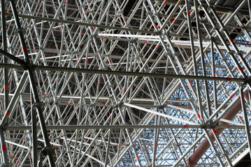 Huge metallic scaffold for building a bridge, view from below
