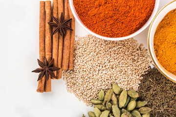  spices in ceramic bowls and on white background stock photo