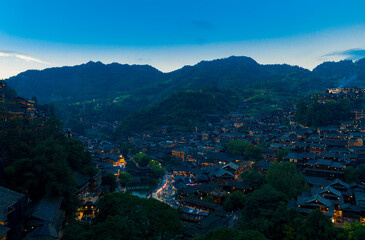 Plakat Night view of Qianhu Miao village in Xijiang, Qiandongnan, Guizhou Province, China