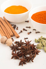 Spices: cinnamon and anise stars Cloves, cardamom and nutmegs Stock photo