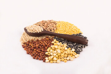 Various spices wooden spoon isolated on white background. stock photo