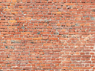 Old brick wall made of red bricks. Brick texture and background.