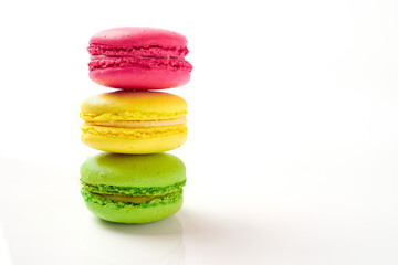 Sweet Macaron of different colors on an white background