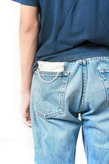 Men's jeans back pocket for a mask during the coronavirus epidemic.