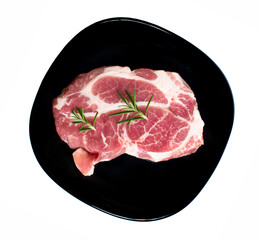 sliced raw pork meat an isolated on white background. top view