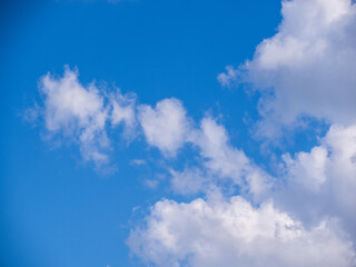 Cloud on blue sky background - zoom and details on clouds - free space to write - high resolution photo