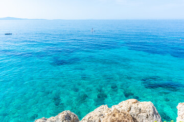Cliffs over the Adriatic Sea next to Jagodna Beach, Hvar, Croatia