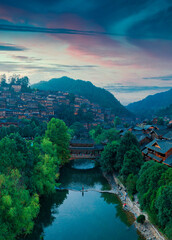 Fototapeta premium Night view of Qianhu Miao village in Xijiang, Qiandongnan, Guizhou Province, China