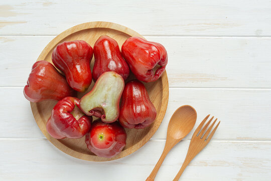 rose apple on white wooden backgroud