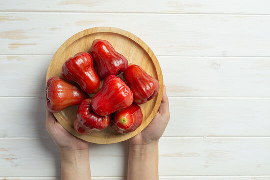 rose apple on white wooden backgroud