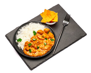 Plate of Traditional Chicken Curry no stone serving board isolated on white background