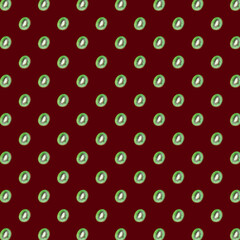Seamless pattern with kiwi halves on maroon. Food backdrop
